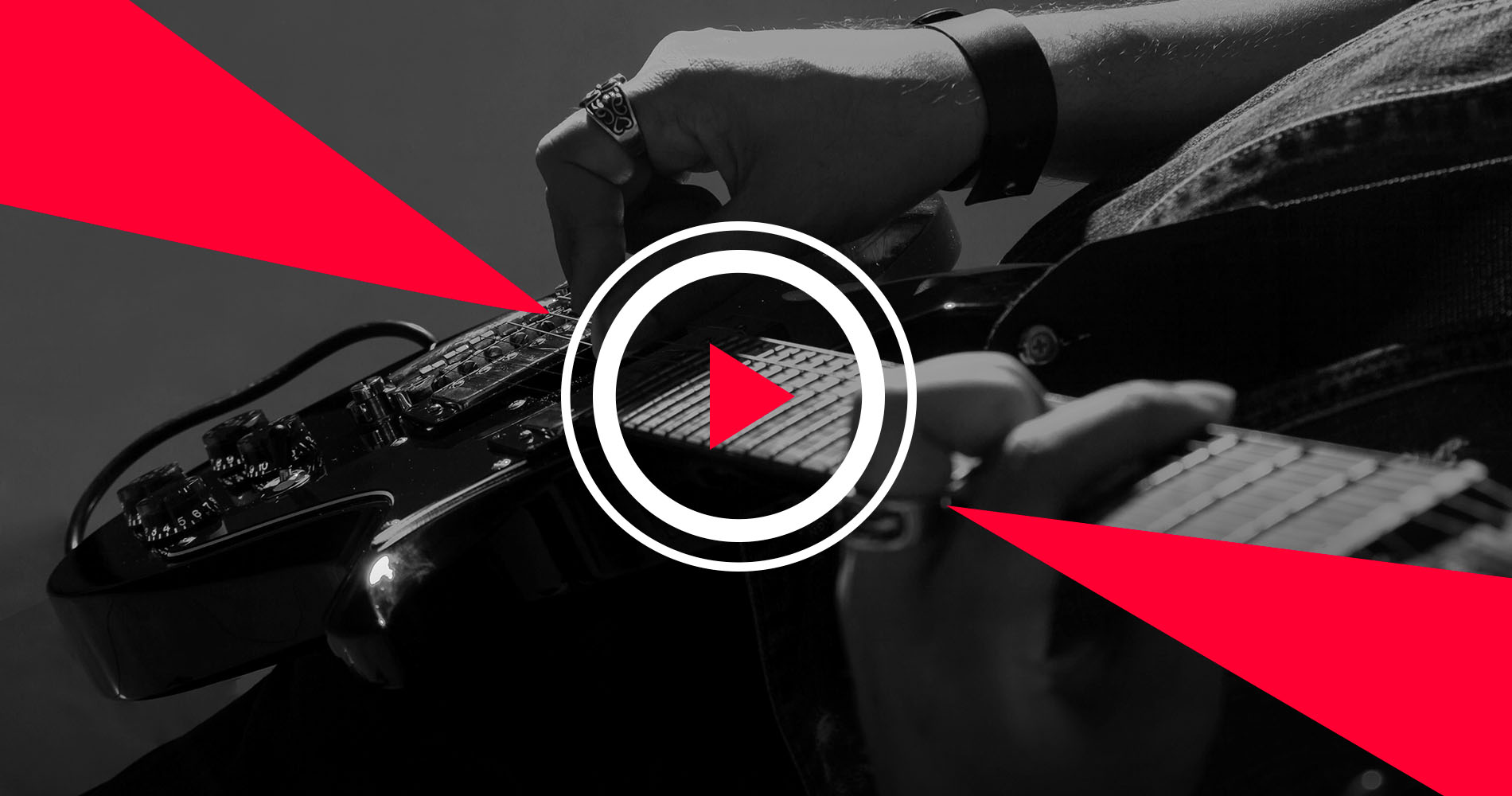 Guitarist close-up with red play button overlay
