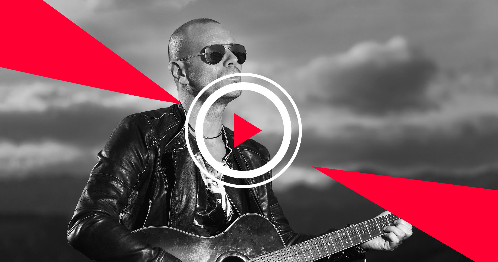 Musician playing guitar in music video thumbnail
